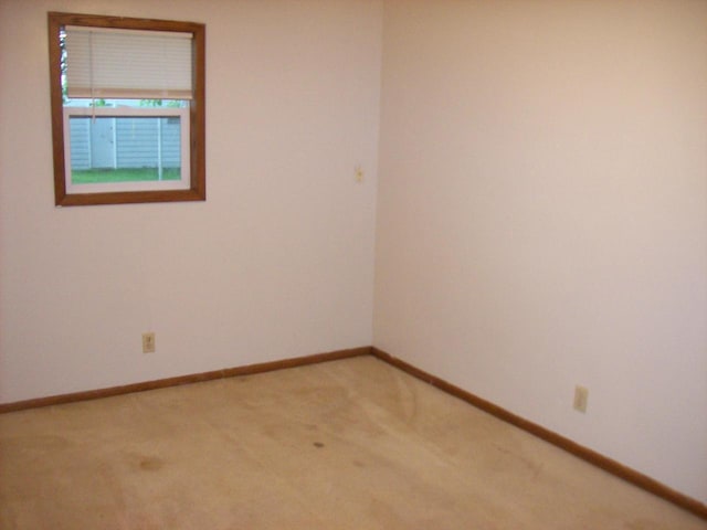 800 Thompson St, Portage, WI 53901 - unfurnished room featuring light colored carpet and baseboards