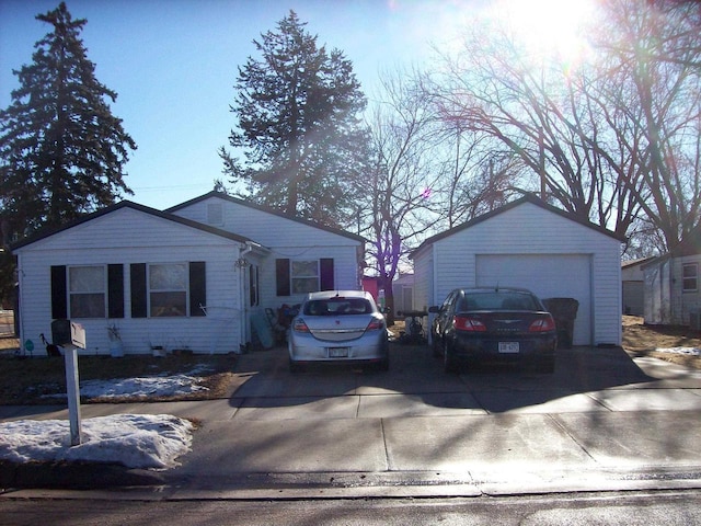 800 Thompson St, Portage, WI 53901 - view of front facade with a detached garage and an outdoor structure