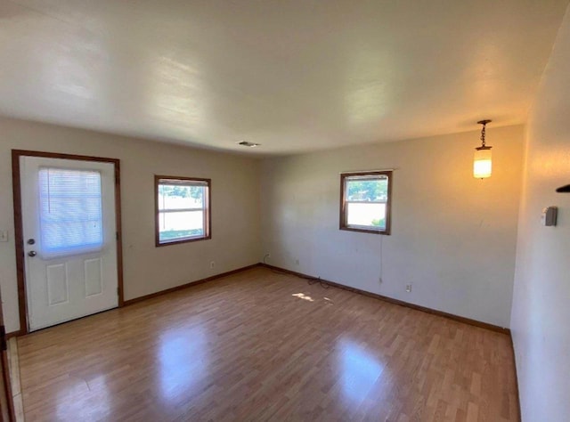 800 Thompson St, Portage, WI 53901 - foyer with healthy amount of natural light and wood finished floors