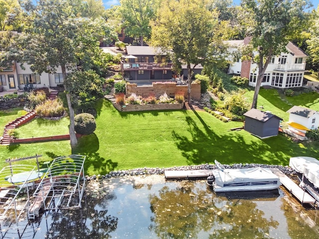 drone / aerial view featuring a water view