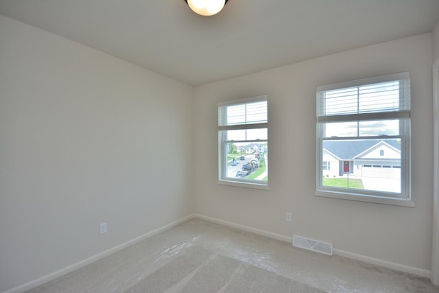 W198N5372 Boxwood Blvd, Menomonee Falls, WI 53051 - spare room featuring light colored carpet and baseboards