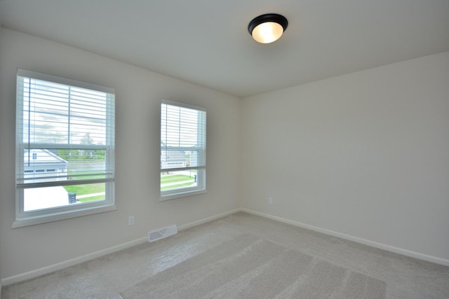 W198N5372 Boxwood Blvd, Menomonee Falls, WI 53051 - unfurnished room with light carpet and baseboards