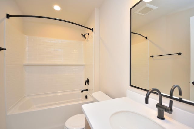 W198N5372 Boxwood Blvd, Menomonee Falls, WI 53051 - bathroom featuring toilet, vanity, tub / shower combination, and recessed lighting