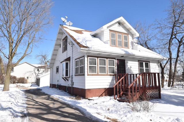 bungalow featuring a garage