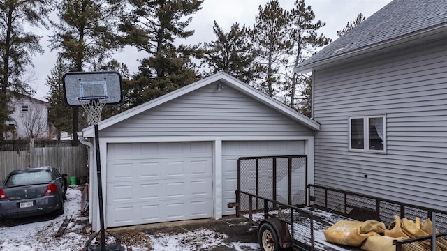 detached garage with fence