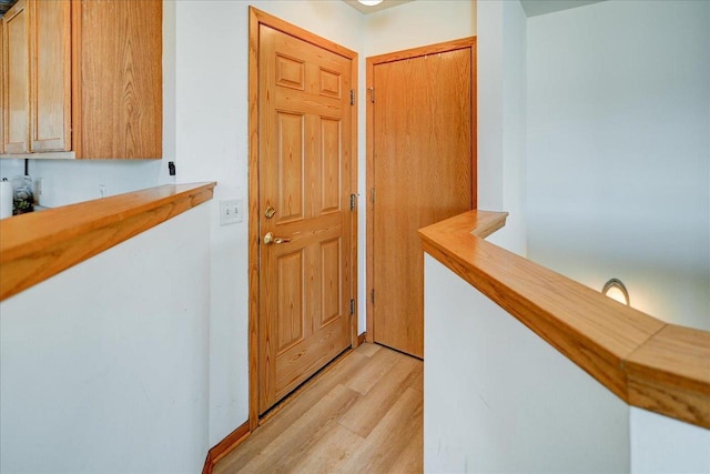 corridor featuring light wood-type flooring