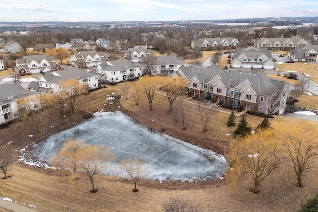 birds eye view of property with a residential view