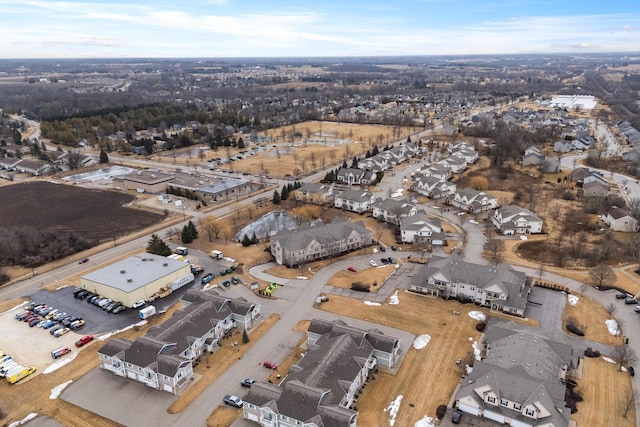 birds eye view of property with a residential view