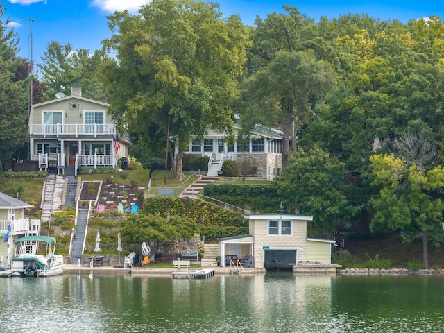 water view featuring a boat dock and stairs