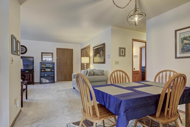 dining area with light carpet