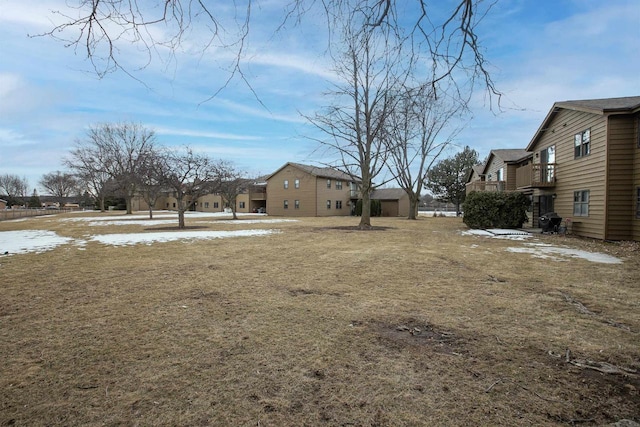 view of yard featuring a residential view