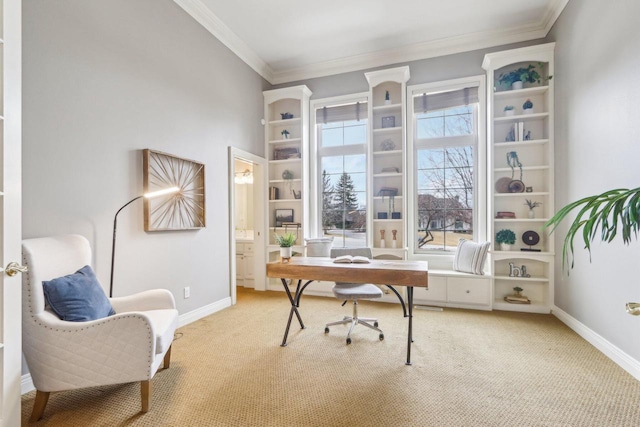 office area featuring light carpet, crown molding, and baseboards