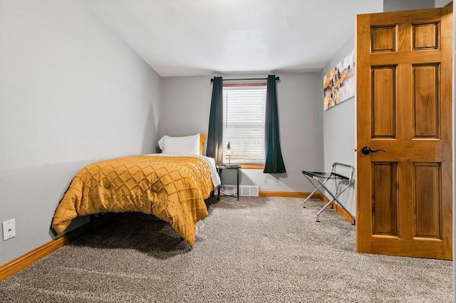 bedroom featuring carpet, visible vents, and baseboards