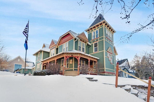 victorian home featuring a porch