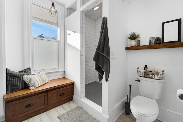 205 State St, Ripon, WI 54971 - bathroom with a stall shower, wood finished floors, toilet, and baseboards