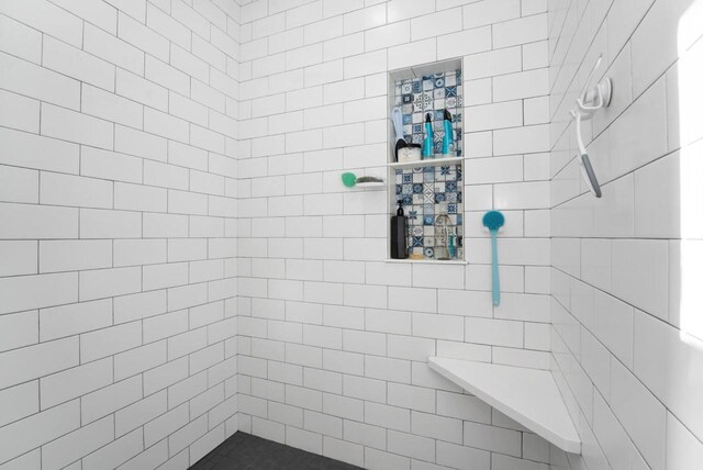 205 State St, Ripon, WI 54971 - full bathroom featuring tiled shower