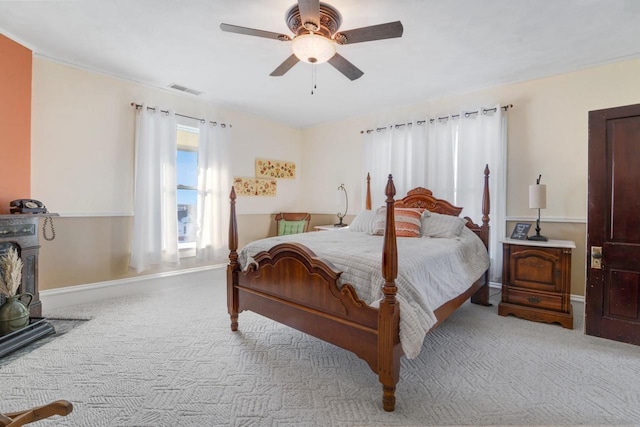 205 State St, Ripon, WI 54971 - carpeted bedroom with visible vents, baseboards, and a ceiling fan