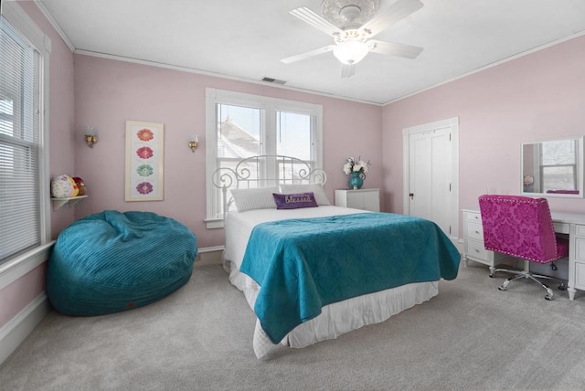 205 State St, Ripon, WI 54971 - bedroom featuring visible vents, a ceiling fan, crown molding, carpet floors, and a closet