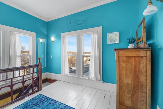 205 State St, Ripon, WI 54971 - interior space with crown molding, baseboards, and wood finished floors