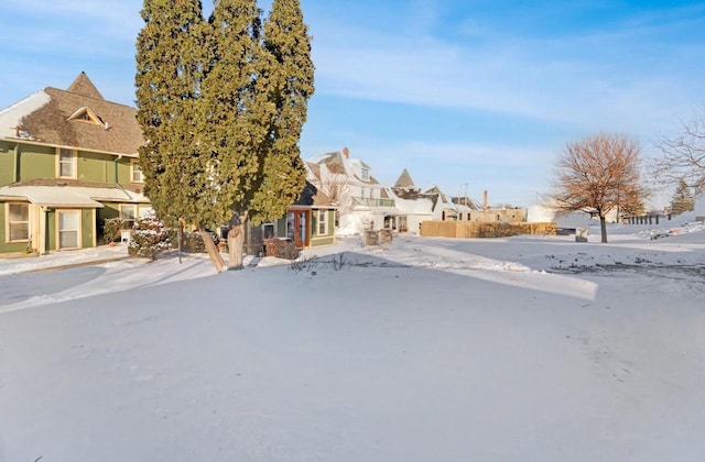 205 State St, Ripon, WI 54971 - snowy yard with a residential view