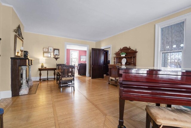 205 State St, Ripon, WI 54971 - living area featuring crown molding and baseboards