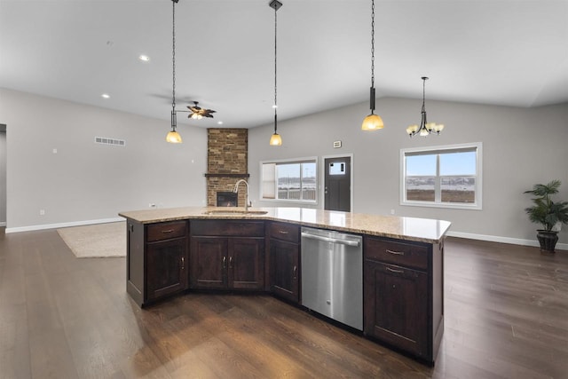 kitchen with a sink, plenty of natural light, visible vents, and dishwasher