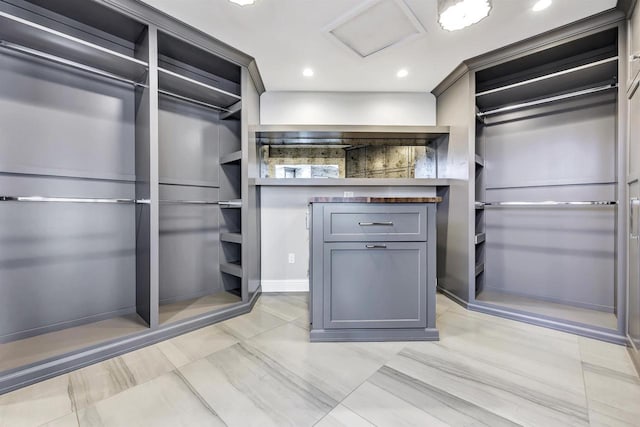 spacious closet with attic access