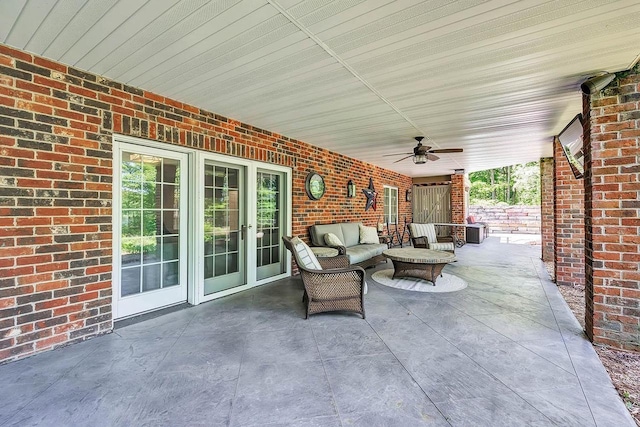 view of patio featuring an outdoor hangout area and a ceiling fan