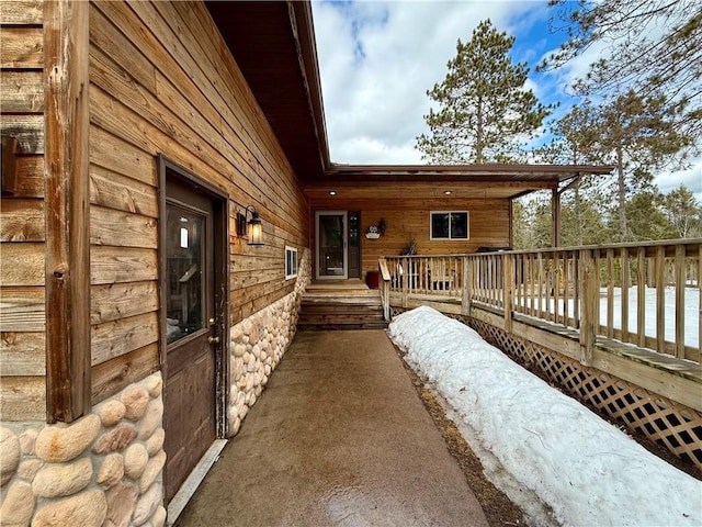 exterior space featuring a wooden deck