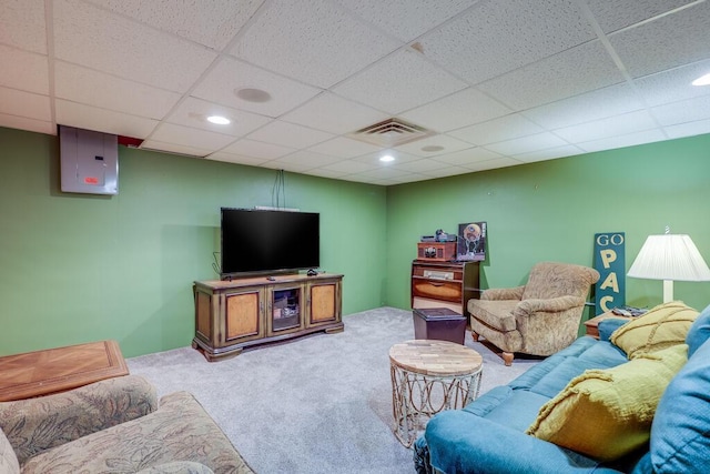 living area featuring a paneled ceiling, carpet, visible vents, and recessed lighting