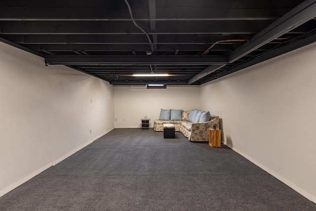 finished basement featuring carpet floors and baseboards