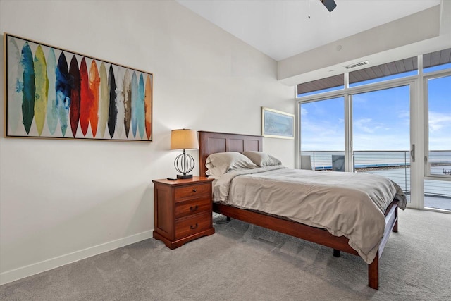 carpeted bedroom featuring ceiling fan, visible vents, baseboards, vaulted ceiling, and access to exterior