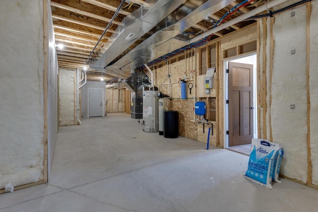 unfinished basement featuring gas water heater