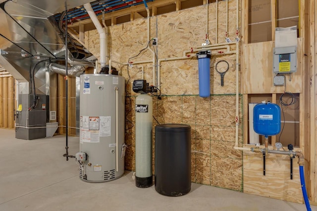 utility room with gas water heater