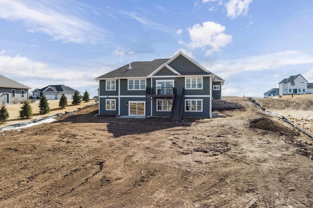 view of front of home with a balcony