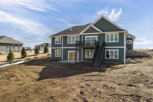 rear view of house with a patio