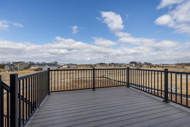 wooden deck with a residential view