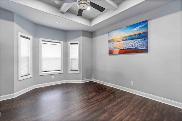 empty room with a ceiling fan, wood finished floors, and baseboards