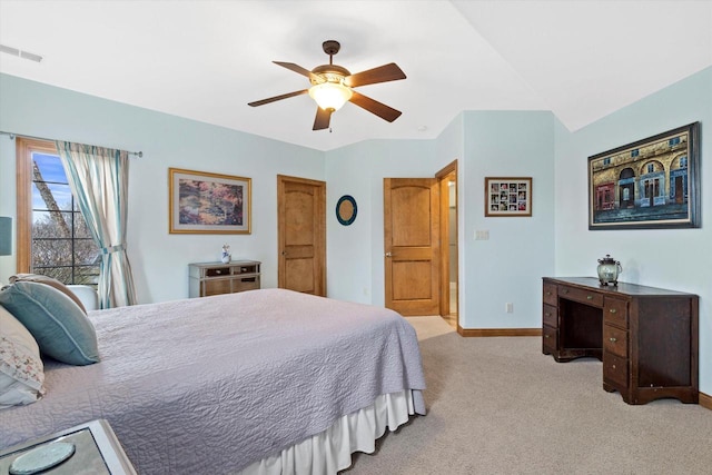 bedroom featuring carpet floors, visible vents, ceiling fan, and baseboards