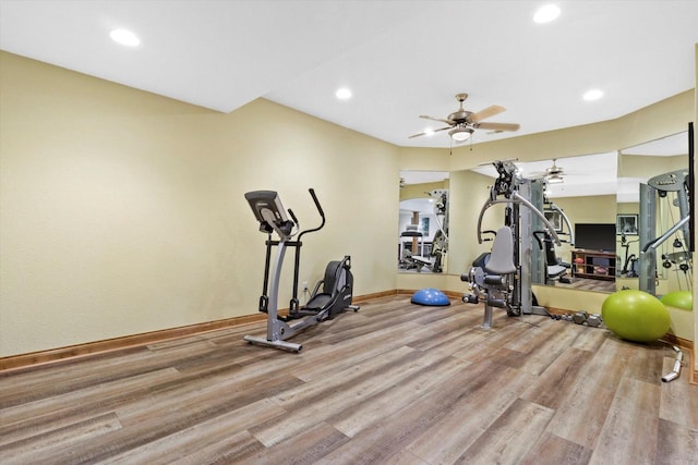 workout room with baseboards, ceiling fan, wood finished floors, and recessed lighting