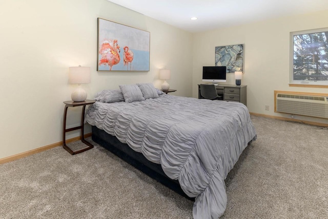 bedroom with recessed lighting, carpet, a wall unit AC, and baseboards