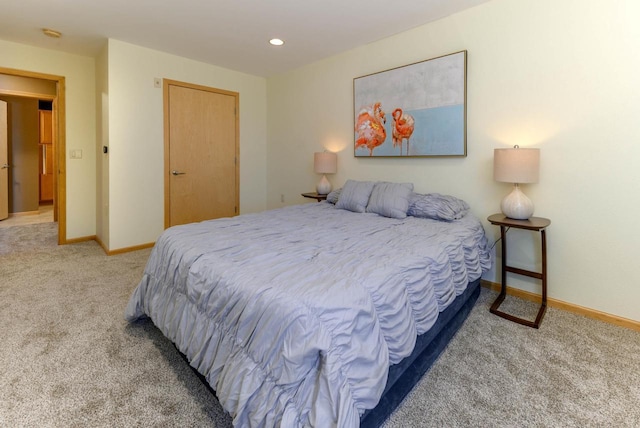 carpeted bedroom with recessed lighting and baseboards