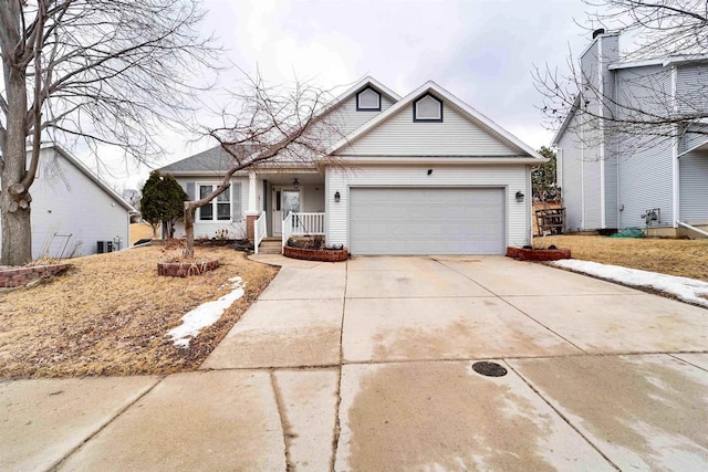 view of front of home featuring driveway and an attached garage