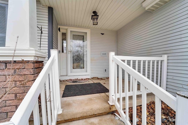 doorway to property with a porch