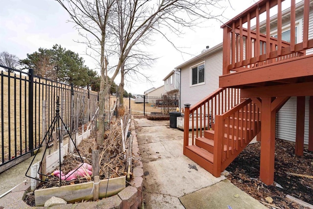 view of yard featuring stairs, a patio, and a fenced backyard