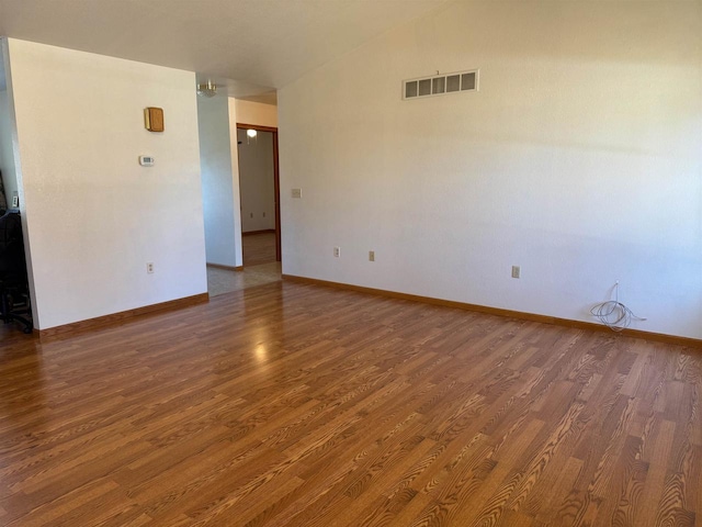 1080 Jaystone Ter, Waterloo, WI 53594 - empty room with baseboards, visible vents, and wood finished floors