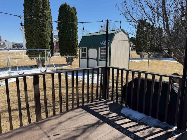1080 Jaystone Ter, Waterloo, WI 53594 - deck with a fenced backyard, a playground, a shed, and an outdoor structure
