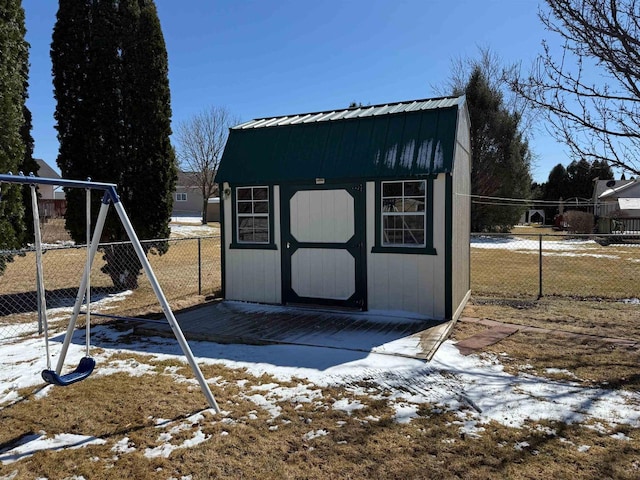 1080 Jaystone Ter, Waterloo, WI 53594 - snow covered structure featuring an outbuilding, fence, and a storage unit