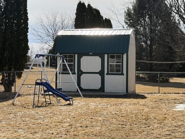 1080 Jaystone Ter, Waterloo, WI 53594 - view of shed with a playground and fence