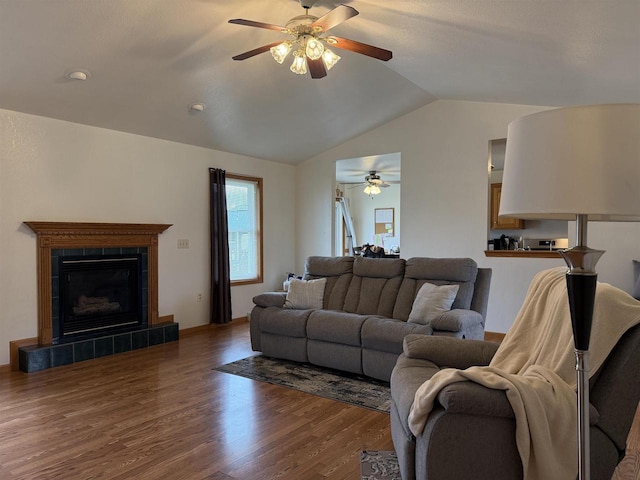 1080 Jaystone Ter, Waterloo, WI 53594 - living area featuring ceiling fan, lofted ceiling, wood finished floors, and a fireplace